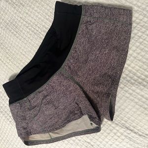 Lululemon shorts, gray and black with black zipper.